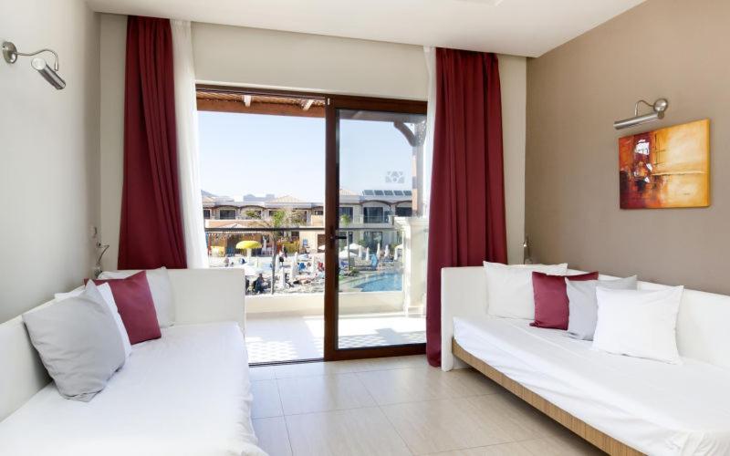 Mythos Beach Resort Afantou Bagian luar foto