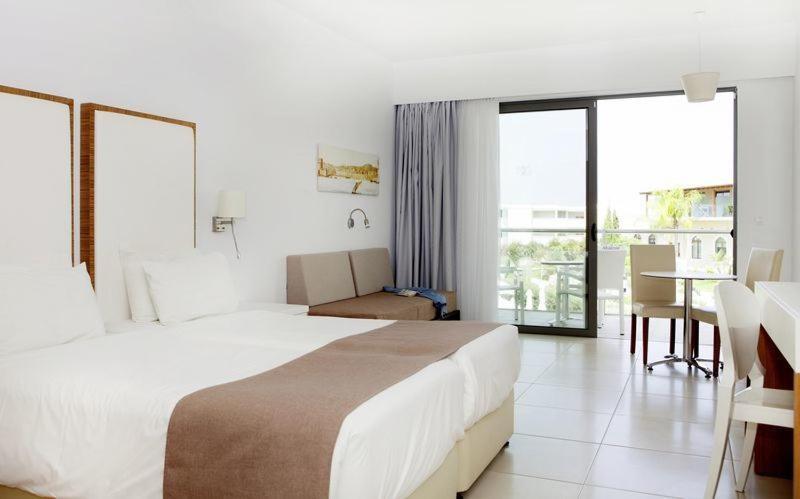 Mythos Beach Resort Afantou Bagian luar foto
